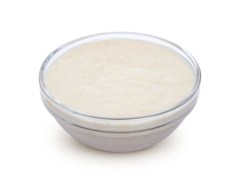 Horseradish sauce in bowl isolated on white background with clipping path