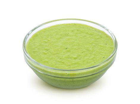 Wasabi sauce in bowl isolated on white background with clipping path