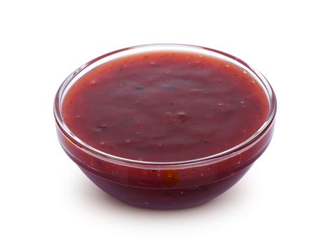 Cranberry sauce in bowl isolated on white background with clipping path