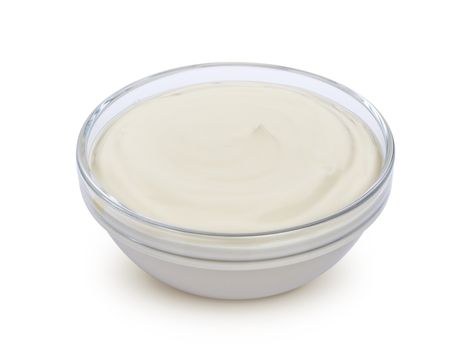 Sour cream in bowl isolated on white background with clipping path