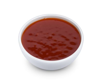 Hot chilli sauce in bowl isolated on white background with clipping path