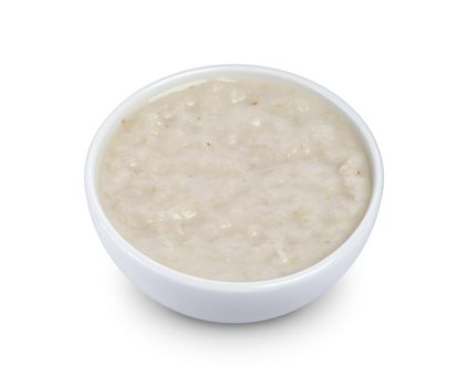 Horseradish sauce in bowl isolated on white background with clipping path