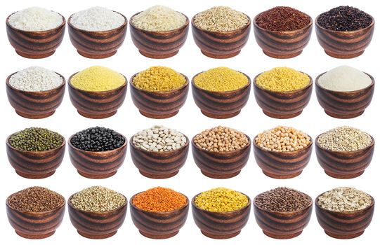 Cereals set isolated on white background. Collection of different groats, rice, beans and lentils in wooden bowls.