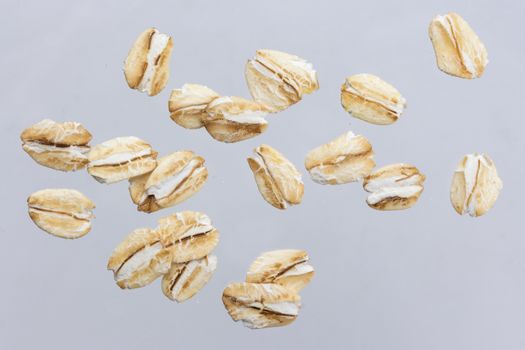 Oat flakes isolated on white background with clipping path. Close up.
