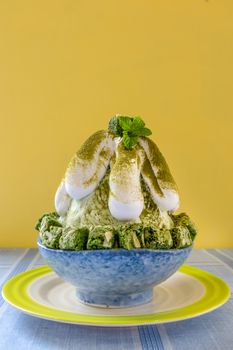 Bingsu - Korean shaved ice dessert with sweet toppings with green tea