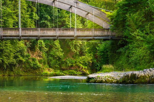 View of the Serio Bridge,close up, from the river during the day,wonderful sunbeams crossing the bridge, Val Seriana Bergamo.