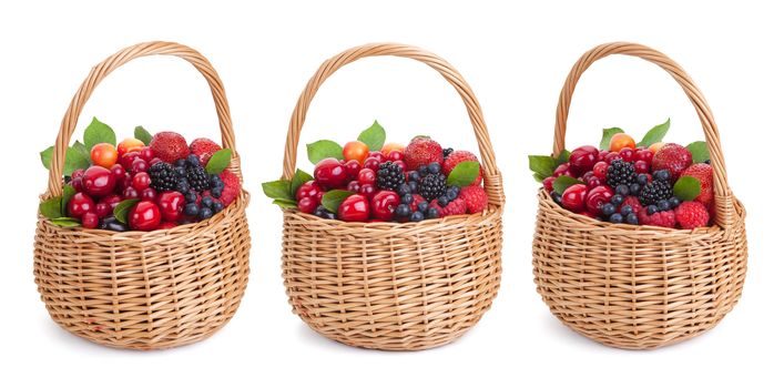 Fresh forest berries in basket isolated on white background with clipping path. Collection