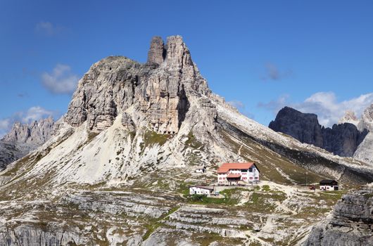 ITALY, DOLOMITES - SEPTEMBER 22, 2014 - Landscape with a refuge in Dolomites mountains