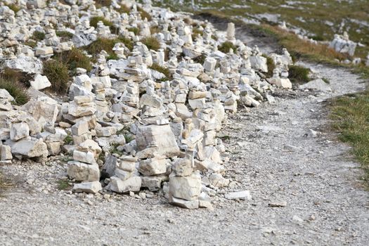 Numerous manmade stone pyramides in Dolomite Alps