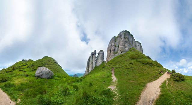 Panoramic view of Mount Ciucas on summer with rock formations, part of the Carpathian Range from Romania