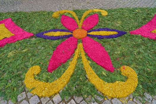 Active group of citizens have done flower pattern on the streets within whole night in order citizens saw such beauty on the morning on May 31