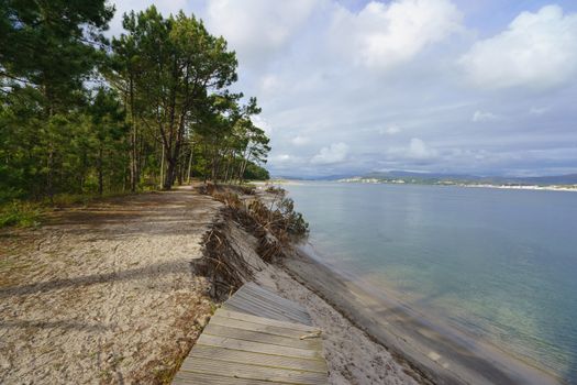 The coast of the river Minya (Northern Spain) at the sunny day