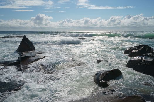 Ocean daytime landscape, giving strength. The space is filled with water, spray and ocean noise