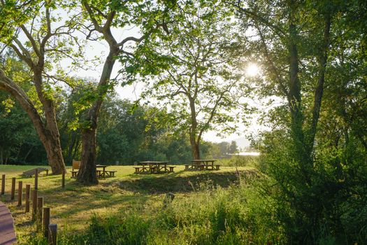 Sunny landscape near the river Minya (Minha), nothern Portugal. Picnic area in the park