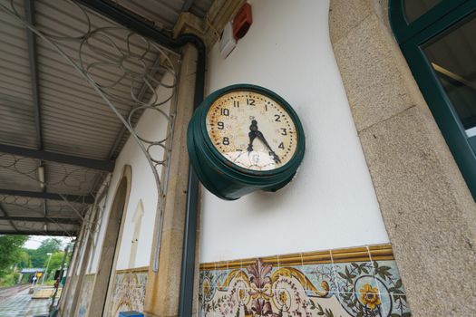 Aged clock at the Caminha railway station