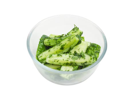 Lightly salted cucumber in the glass bowl on a white background

