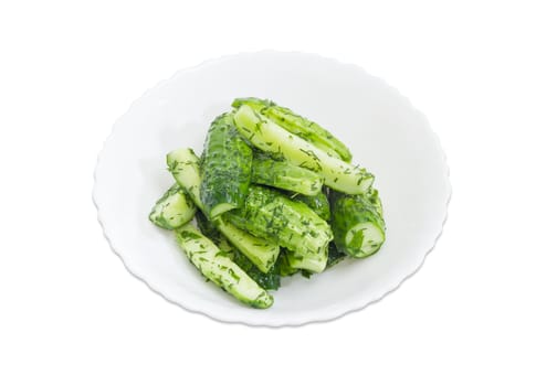 Lightly salted cucumber on the white dish on a white background
