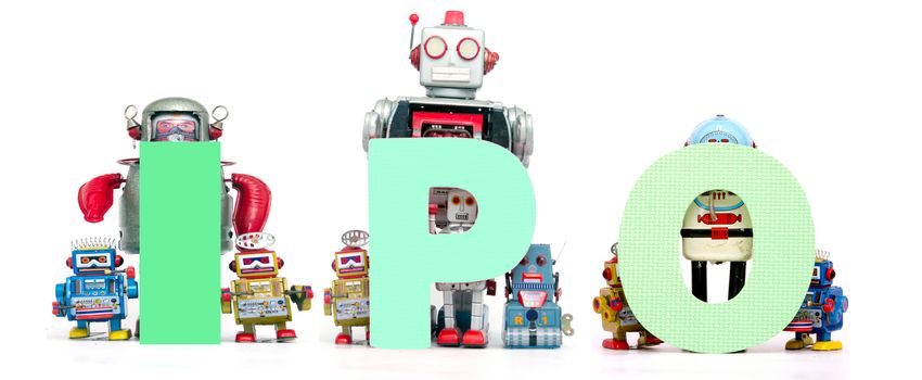 retro tin robot toys hold up the acronym  IPO isolated on white