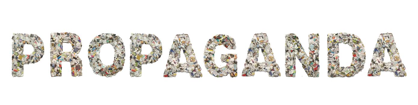 the word     PROPAGANDA made from newspaper confetti isolated on old paper