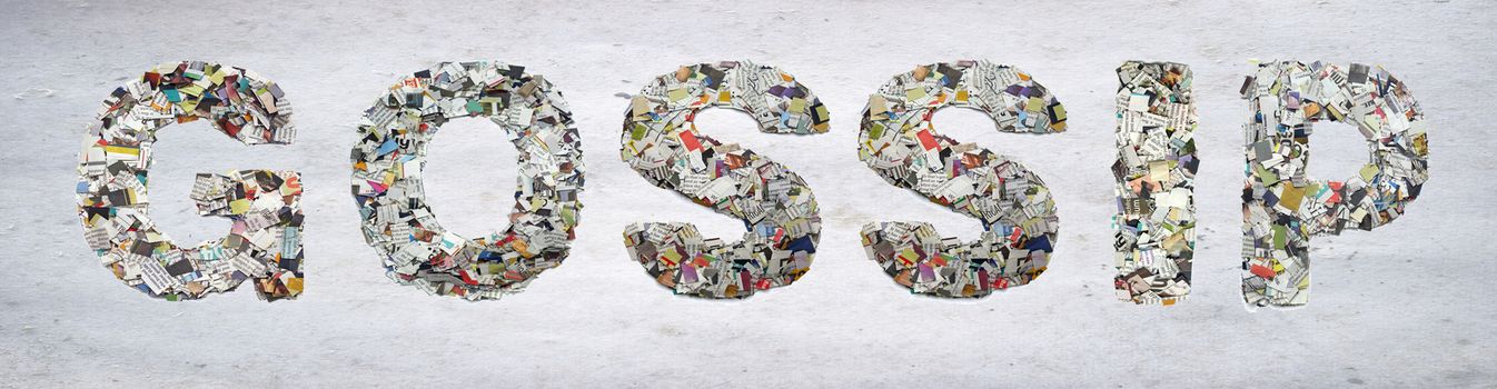 the word  GOSSIP made from newspaper confetti on old paper 