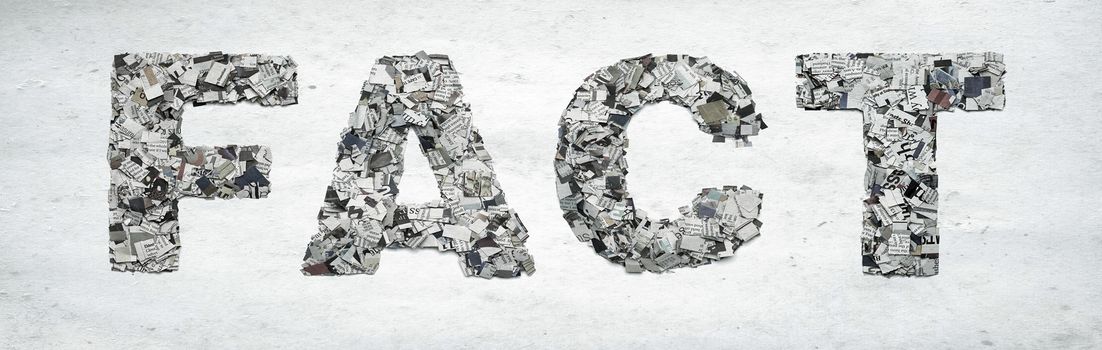 the word FACT made from newspaper confetti  on old paper