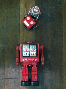 concept fixing your head with rteo robot toys on old wooden floor