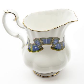 Small ceramic creamer with ribbon pattern