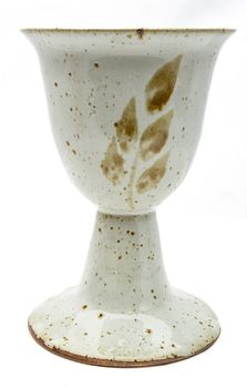 Isolated wine chalice with leaf pattern