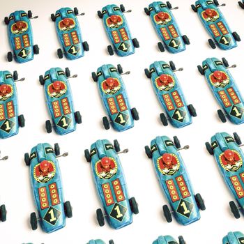 old blue race car toy pattern on white 