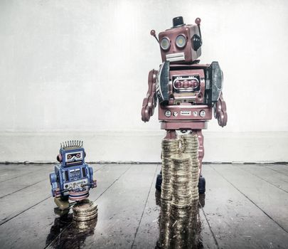 rich man poor man concept with retro robots on a old wooden floor with reflection