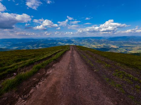 tropped mountain road leading down to the plain. A good place to go through the tourist routes