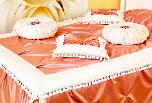 Classical satin pillows in apricot color