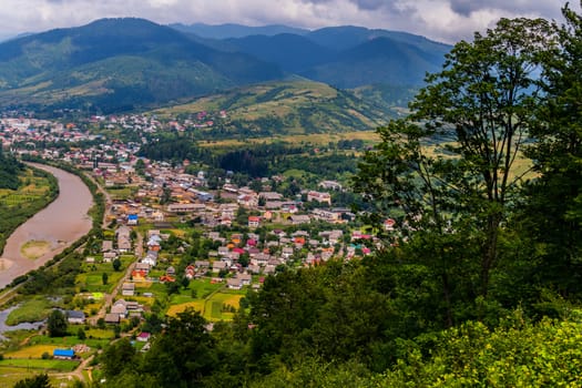 View from the mountain to the city near the river