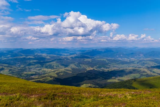 Carpathian plains with a lawn in the foreground