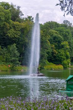 a unique tall fountain from the mouth of the snake in the Sofiyivka park. Uman Ukraine