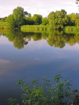 A wonderful transparent river, dividing two picturesque green beaches