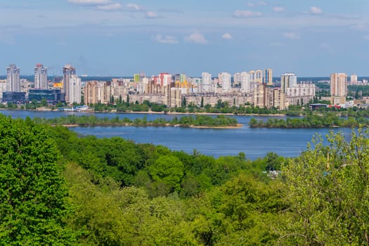 high-altitude urban area of the city and rolling along its waters a large river