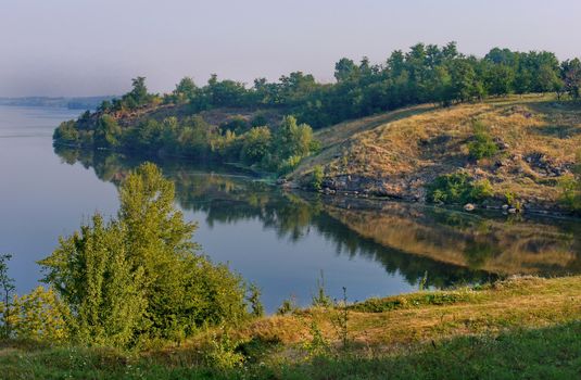 Pond with semicircular shores. It's great to swim there on a hot summer day