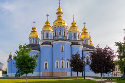St. Michael's Golden-Domed Monastery sparkles with its domes in sunshine. Kiev. Ukraine