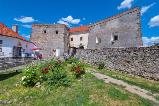 Buildings of ancient stone and catering establishments in them