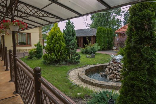 The original fountain and ornamental spruce located right in the center of the promenade area have a tempting view