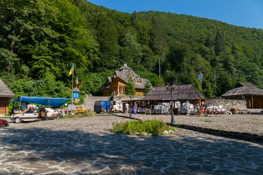 a souvenir bazaar on a stone square near the mountains for attracting tourists