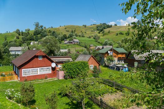 The countryside with wooden houses in the mountains