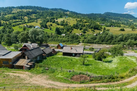 panorama to the village in the Carpathians against the backdrop of the hills