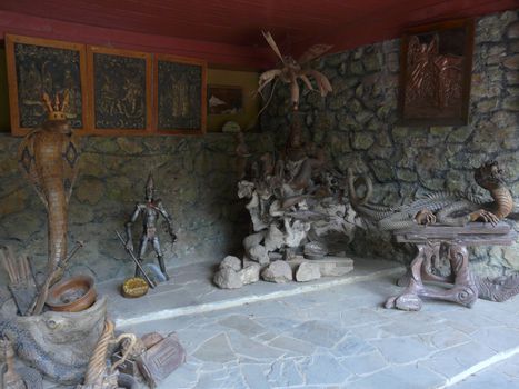 Images of fairy-tale characters, made from different materials on the background of stones