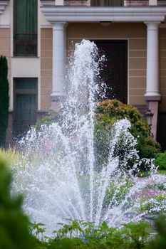 transparent jets of a fountain are refreshing and invigorating by one's appearance on a hot day