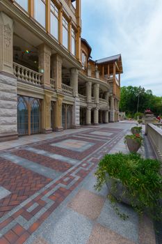 balconies with majestic columns in an elite house on the high rise near a beautiful park. Mezhigirya. Ukraine