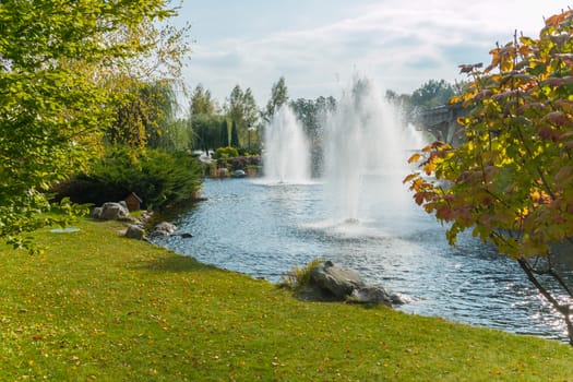 The green zone with huge decorative fountains in the middle of the transparent lake