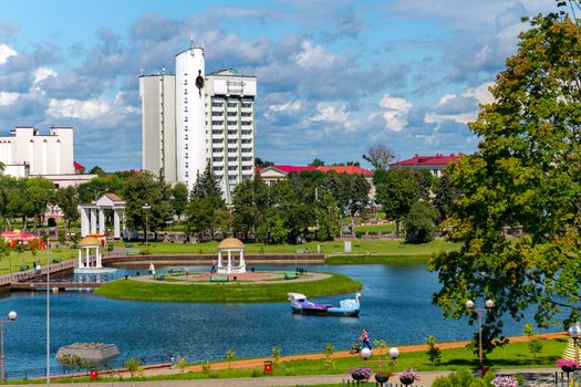 Beautiful, green park area with a pond. You can swim on a raft, sit in an arch on an island