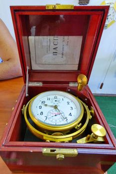 Antique antique large clock with white dial in decorative wooden box